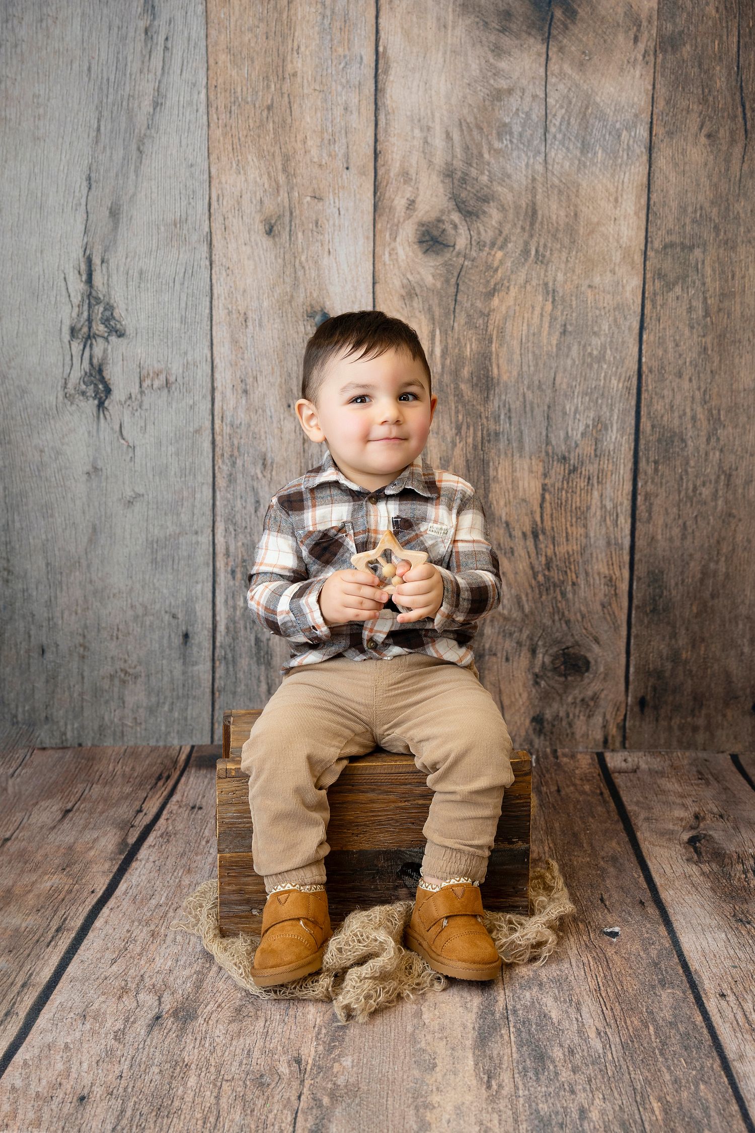 Baby smiling during a milestone session